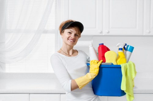 Technician using careful carpet cleaning methods in a managed indoor space
