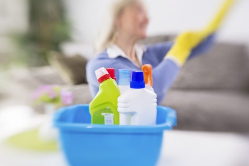Local office cleaning team maintaining shared workspaces in KT6